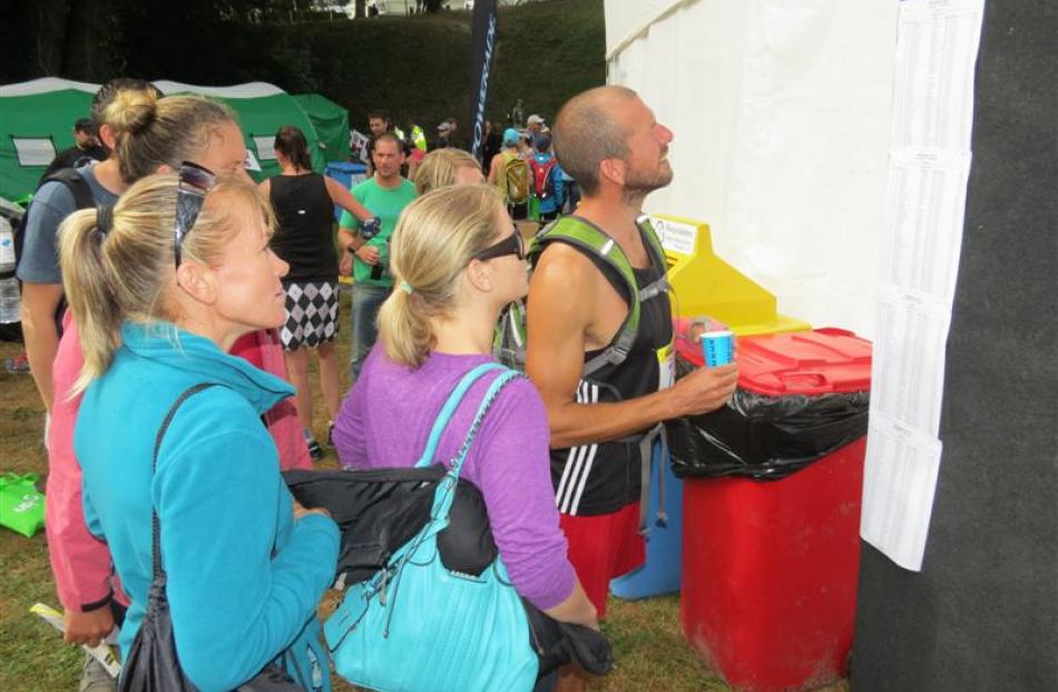 Competitors were keen to view the race results as soon as they were  posted.