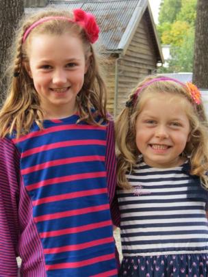 Olivia  (8) and Lexi (5)  Bonner, both of Dunedin, were cheering from the sidelines.