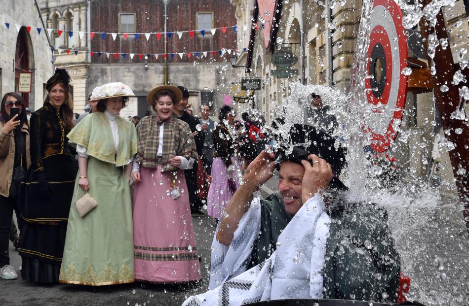 John Baster, of Oamaru, cops the bucket of water at the dunking stand. PHOTO: STEPHEN JAQUIERY