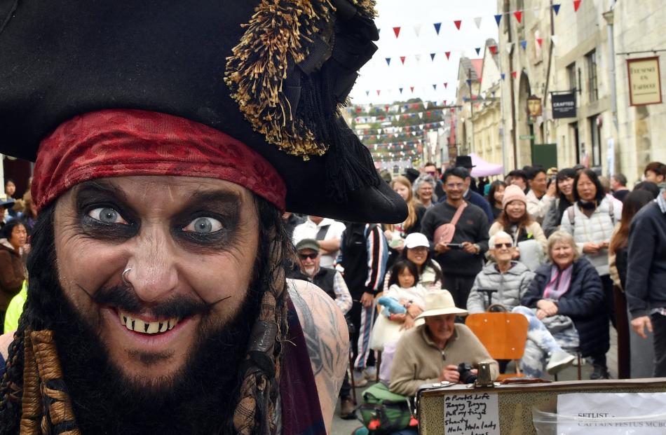 Rich Manic, of Auckland, as Captain Festus McBoyle entertains the crowd at the Victorian fete in...