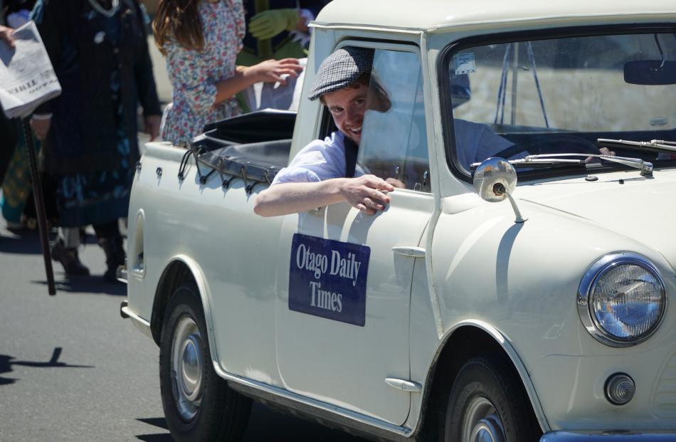 Driving the Otago Daily Times Mini in the parade is reporter Wyatt Ryder.