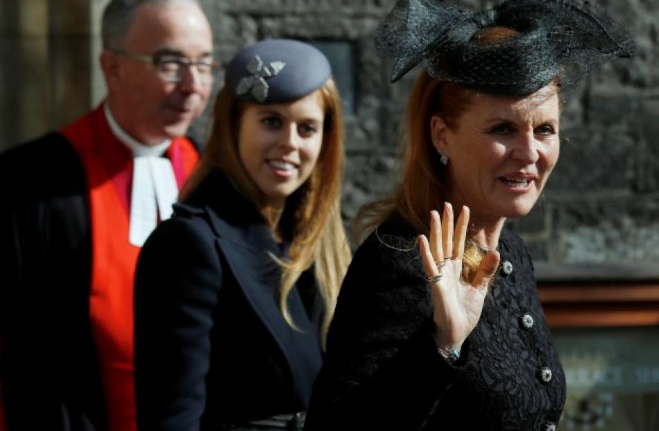 Princess Beatrice (C) and her mother, Sarah Ferguson.