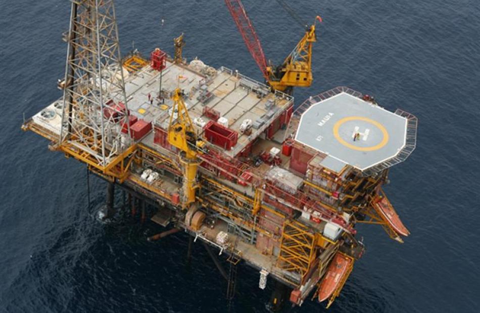 The hardware of the Taranaki oil and gas industry, offshore rigs and onshore processing stations.