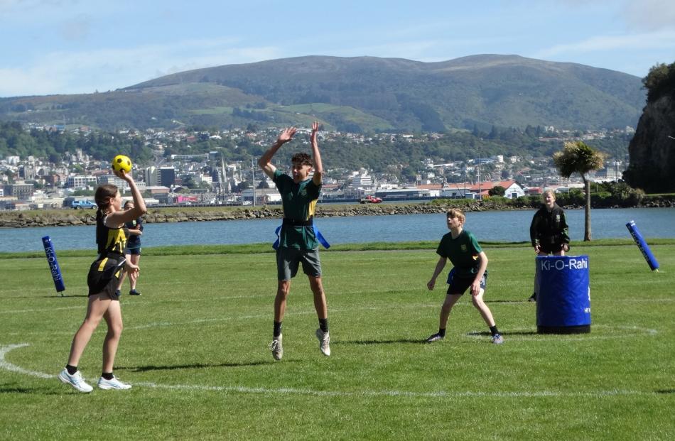 Madison Cooper (East Otago) prepares to throw the ki, Felix Culling (Bayfield) jumps and Rupert...