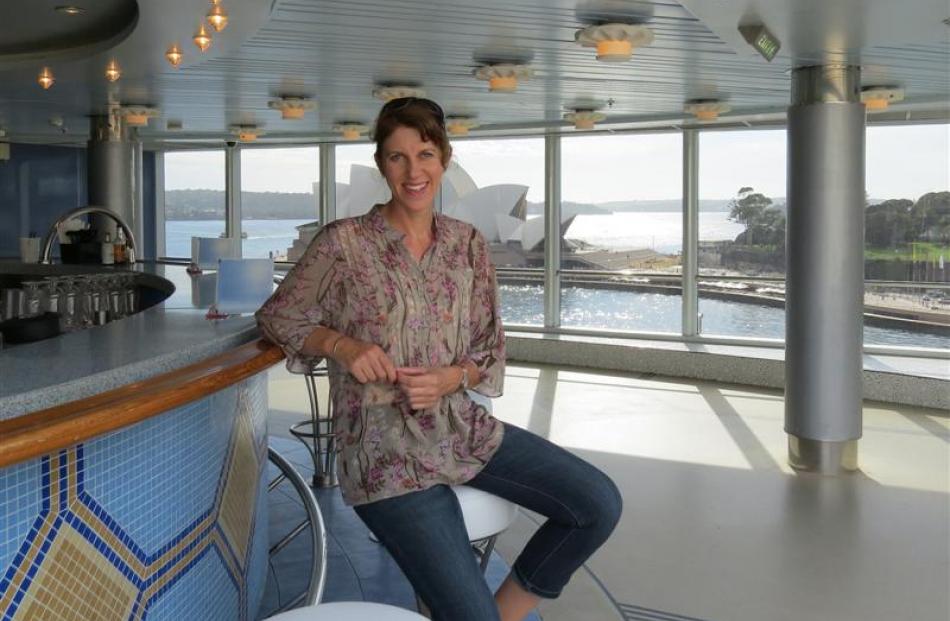 Louise Frampton relaxes in the poolside bar as her five-night cruise from Auckland to Sydney...
