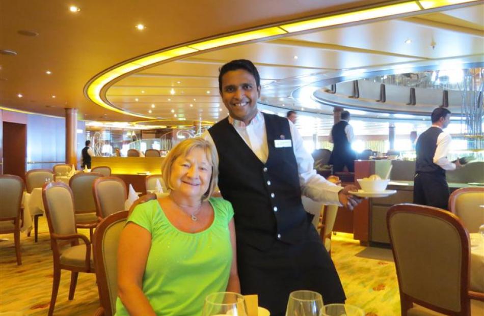 Marion Patterson, of Perth, looks forward to her dessert during lunch in the Meridian Restaurant....