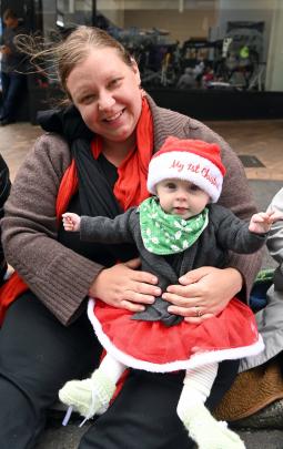 Elizabeth Ferguson of Dunedin and her daughter Amelia Thornton, 7 months, watch the parade.