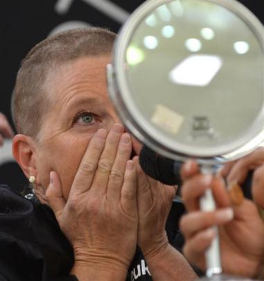 Amanda Turnbull, of Dunedin, gasps as she sees her new hairstyle at Farmers  on Thursday. Photo...