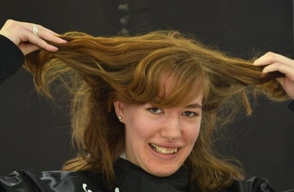 Student Merel Monteiro (18), of Dunedin, shows off her locks at Farmers  on Thursday. She then...