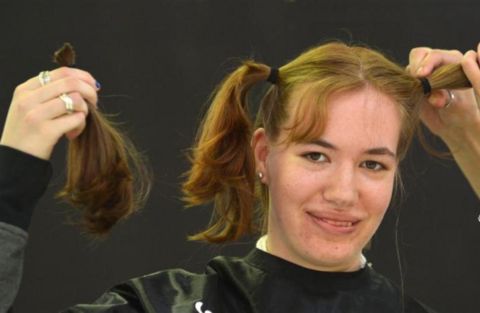 Student Merel Monteiro (18), of Dunedin, shows off her locks at Farmers  on Thursday. She then...