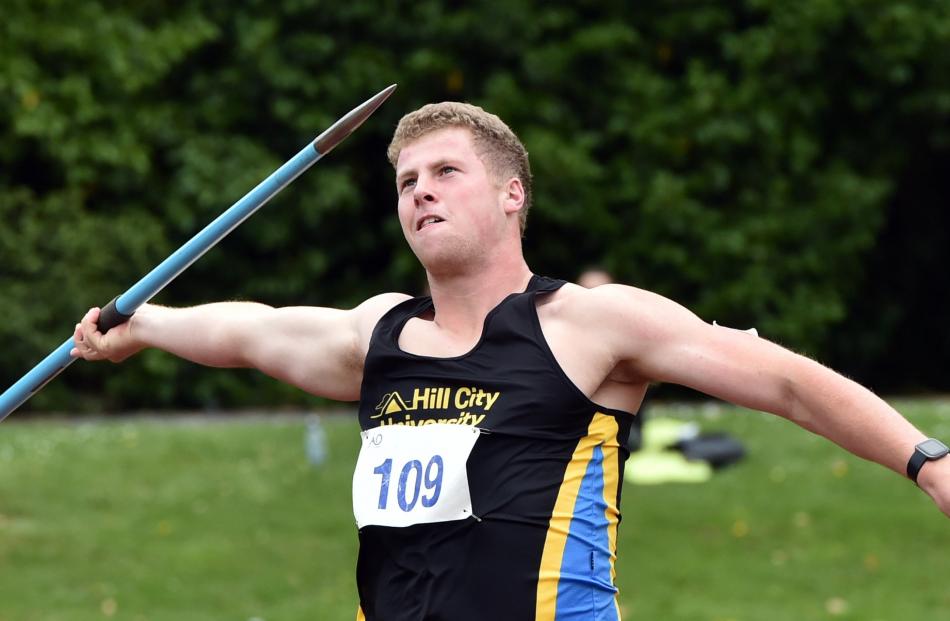 Cameron Moffitt sets to throw the javelin.