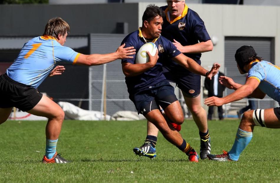 Dunedin fullback Trent Renata steps through the University A defence. Photo Caswell Images