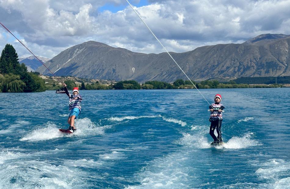 On the crest of a wave ... Getting a wakeboard in before Christmas lunch, on Lake Ruataniwha,...