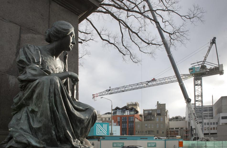 A timely burst of sunshine lit up this statue at Queens Gardens as I was photographing riggers...