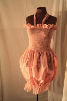 A gown by Miranda Joel.