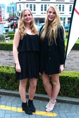 Annabelle (left) wears a Ginger G dress and Country Road boots, and Maddie wears a Laura Ashley...