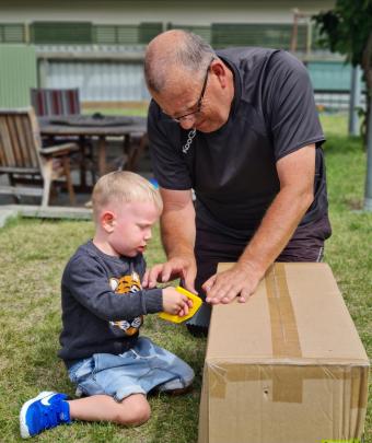 Pop and Noah (Trevor Bell, and Noah, 2,) saw a big cardboard box to pieces in Cromwell. PHOTO:...