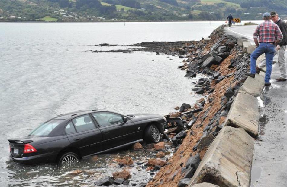 A Holden Commodore ended up in Otago Harbour at Company Bay, near Raynbird Rd, about 1pm on...