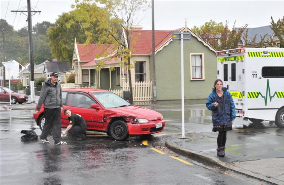 A Honda hatchback and a Holden Commodore crashed at the intersection of Cumberland St north and...