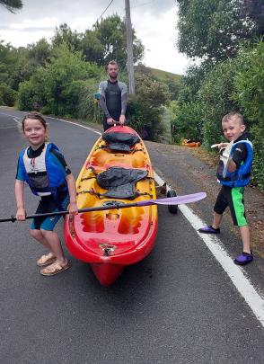 A-kayaking we will go ... Chris Stevens and his children, Sophie, 7, and Mase, 5, get ready to go...