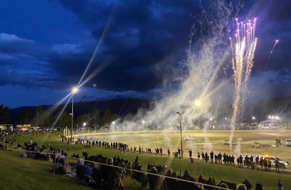 Ready to race . . . Fireworks light up the grand parade before the final of the 2023-24 New...