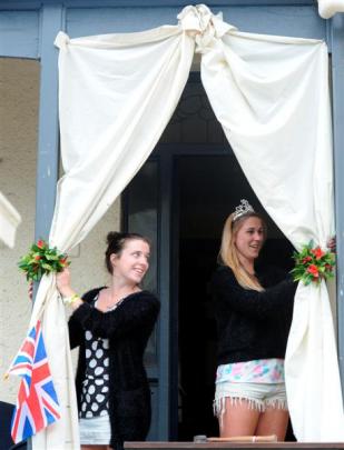 Hyde St flatmates Hannah Flett (20, left) and Shanyn Ruthe (20) prepare their 'Your Royal...