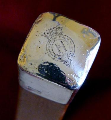 The top of the cane bearing the motto of the Order of the Garter. Photos by Gerard O'Brien.