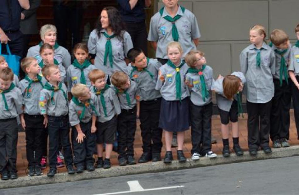 Young scouts await the arrival of the royals. Photo by Gerard O'Brien