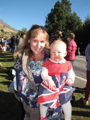 Eleven-month-old Charlotte Spence, of Cromwell, in a special Union Jack dress, with her mother,...