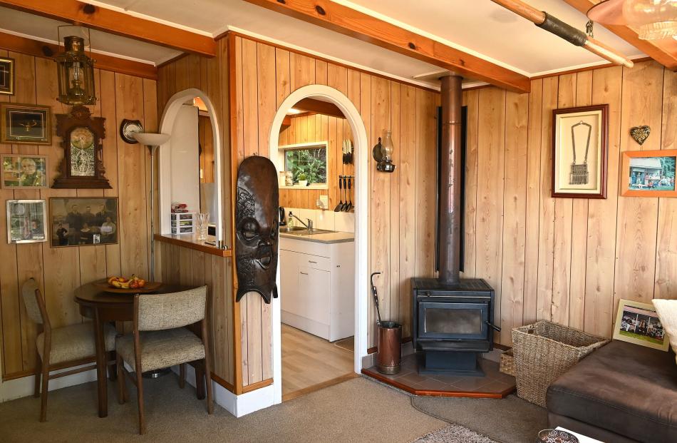 The kitchen, just visible through the arch, was installed by the current owners.