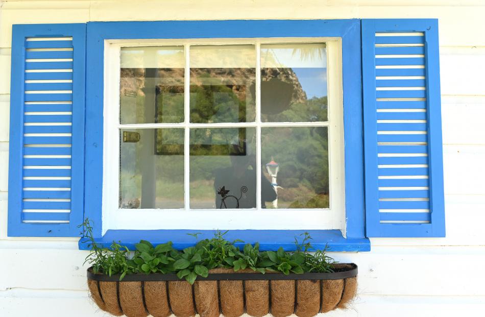 Before moving into the cottage, the owners spent half of each year sailing around Greece; the...