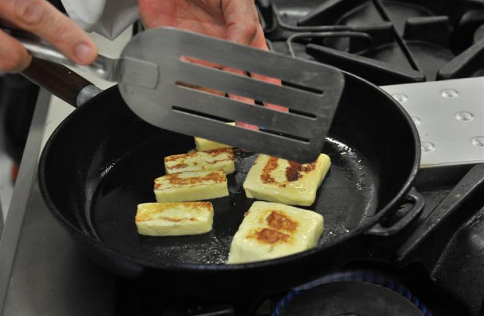 Grilling the haloumi.