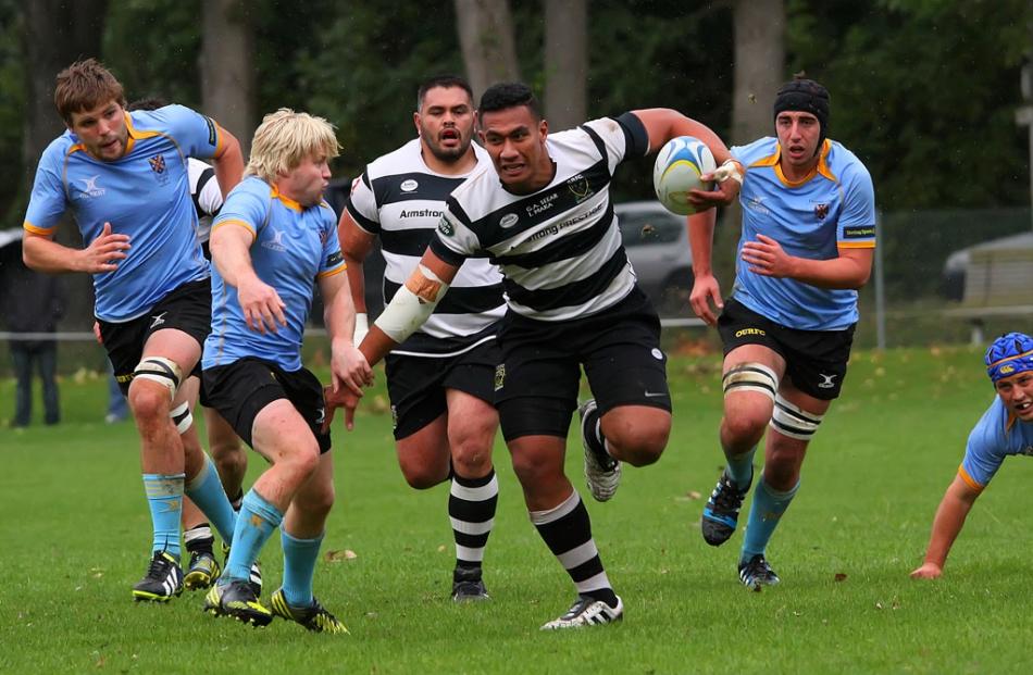 Southern No 8 Lafaele Faamoe makes a break through the University A backline at the University Oval.
