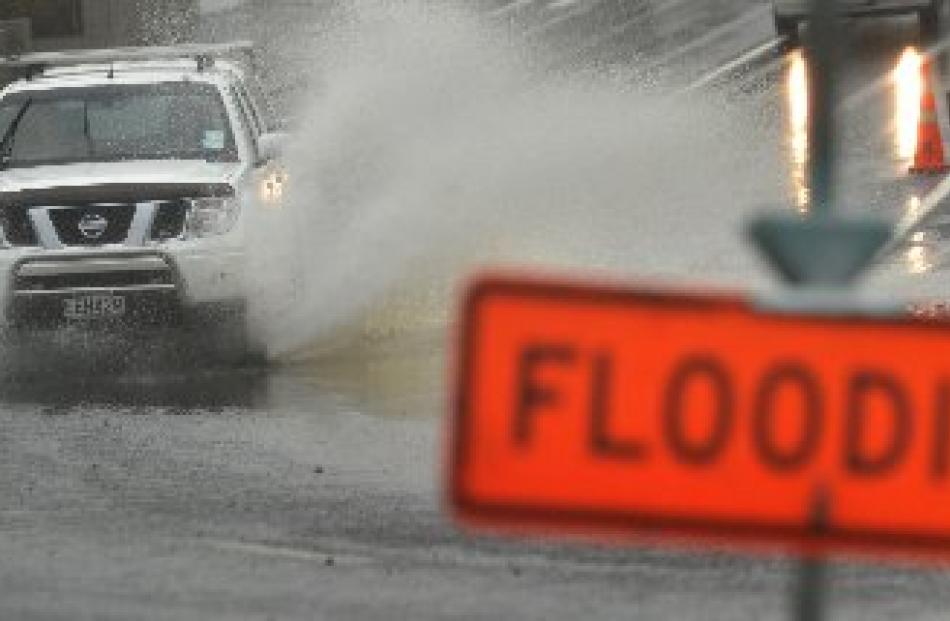 Surface flooding affected many roads in coastal parts of Otago yesterday, including this one on...