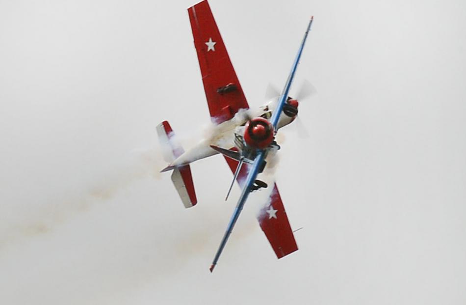 Two World War 2 Yak 3 aircraft perform.