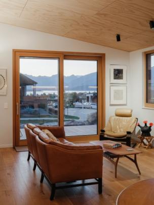 Triple-glazed windows capture the surrounding scenery, including Lake Wānaka. PHOTOS: MICKEY ROSS...
