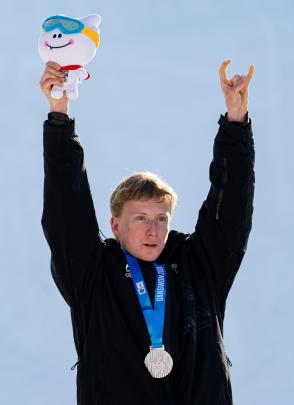 Finley Melville Ives, of Wānaka, celebrates getting second in the Freestyle Skiing Men’s Freeski...