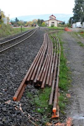 New lengths of rail stockpiled at Wingatui Station await installation in the Wingatui tunnel.