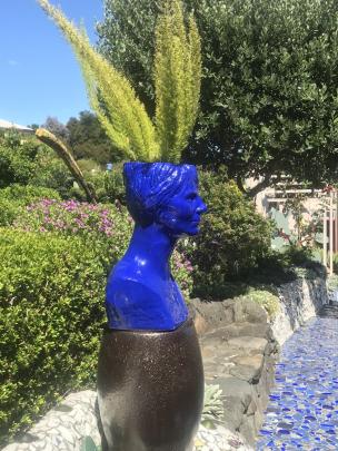 A ceramic head by Josie Martin doubles as a planter. PHOTOS: GILLIAN VINE