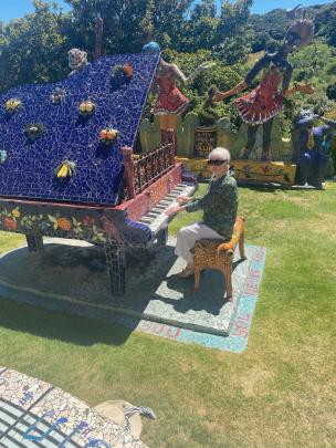 Gillian Vine mimes playing on Josie Martin’s mosaic piano. PHOTO: MARK BARRATT-BOYES@THEWRITESTUFF
