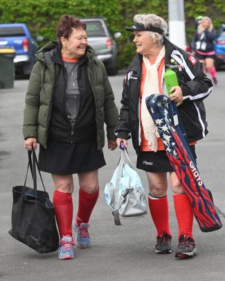 Nellie McDonald, 74 (left), and Dianne Foley, 77, both of Auckland, carry their gear before their...