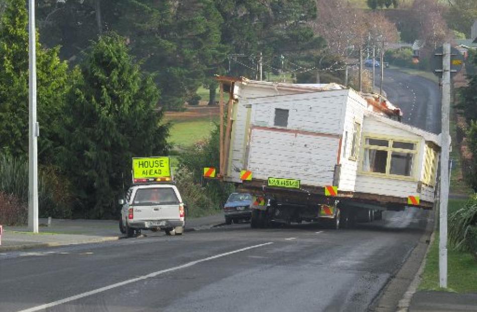 Part of the house begins its journey to East Taieri.
