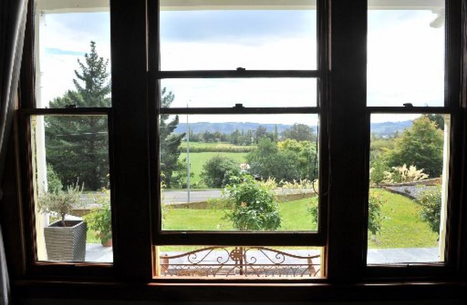 The lounge window provides views across the Taieri Plain.