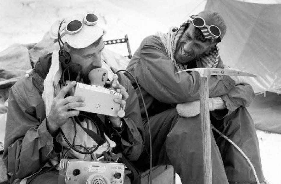 George Lowe (left) and Edmund Hillary share a light-hearted moment on the expedition. Photos by...