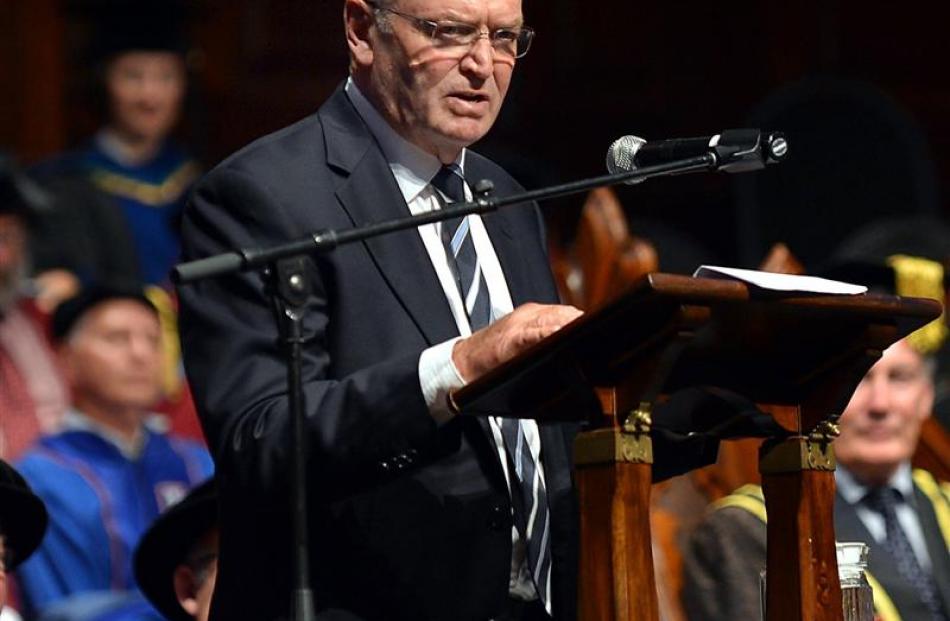 Former All Blacks coach Sir Graham Henry addresses  graduates. Photos by Peter McIntosh.