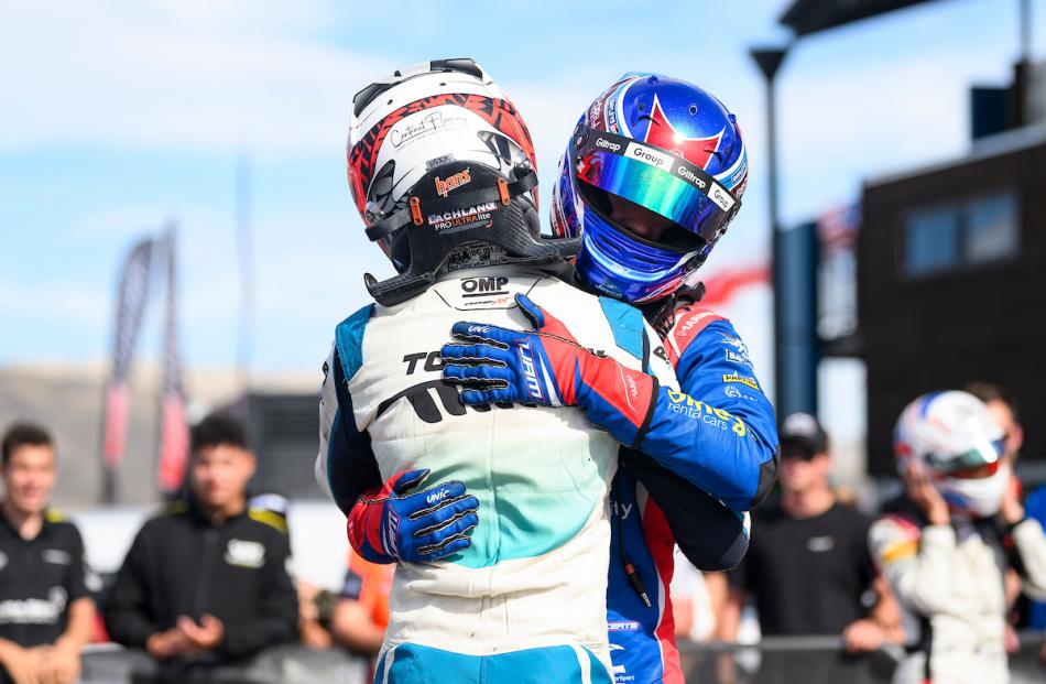 Hugs for the champion.