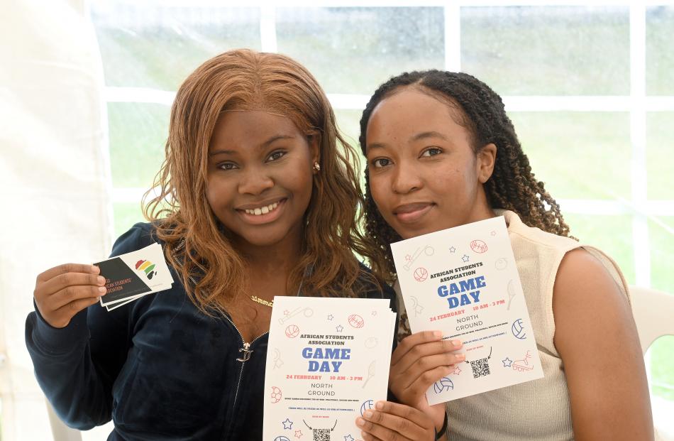African Students Association president Tammie Sibanda, 20, (left) and social marketer Nyasha...