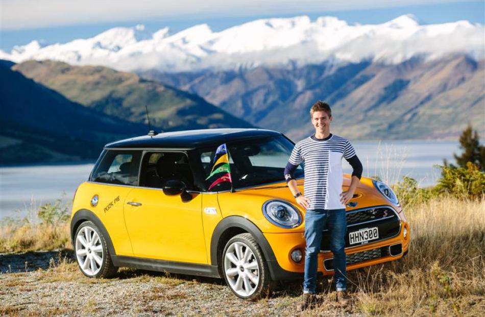 Vincent Blake Chilton with the Mini that stars in a  commercial shot at Lake Hawea yesterday.