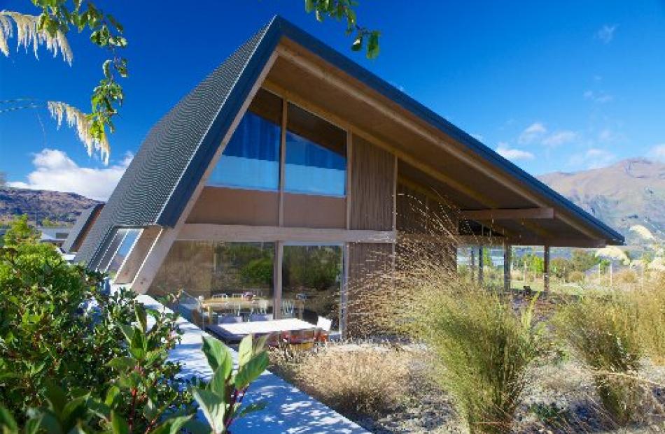 The home's bold form was inspired by old miners' huts which often consisted of a sheet of roofing...