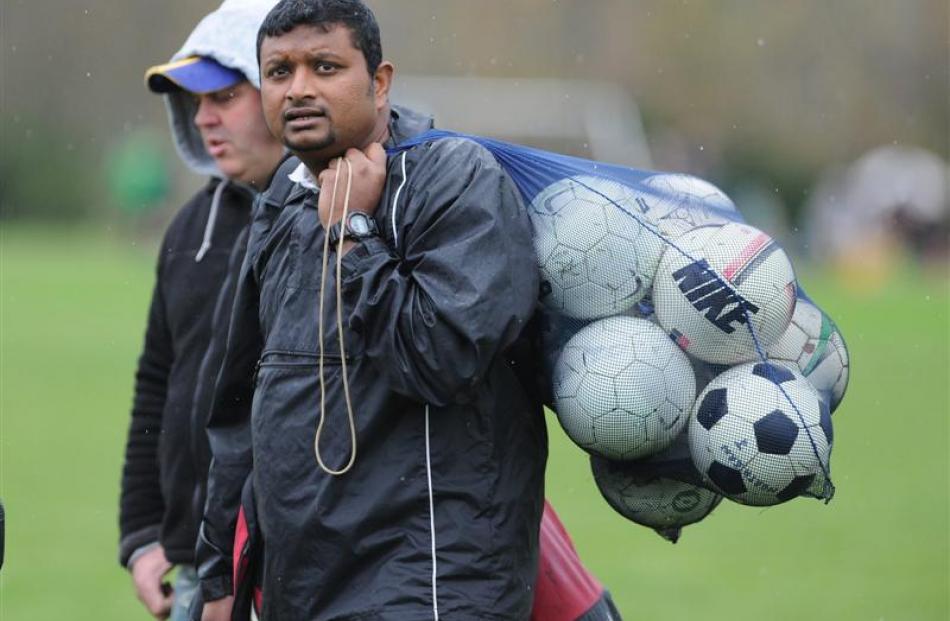 Northern White 10th grade coach Lux Selvanesan (right) and supporter Jeremy Dalwood prepare for a...